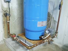 where should pressure tank be located